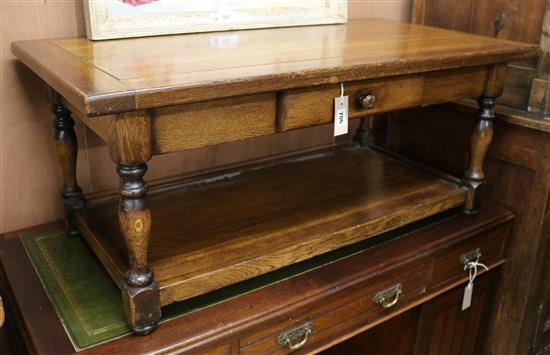 An oak two tier coffee table W.105cm